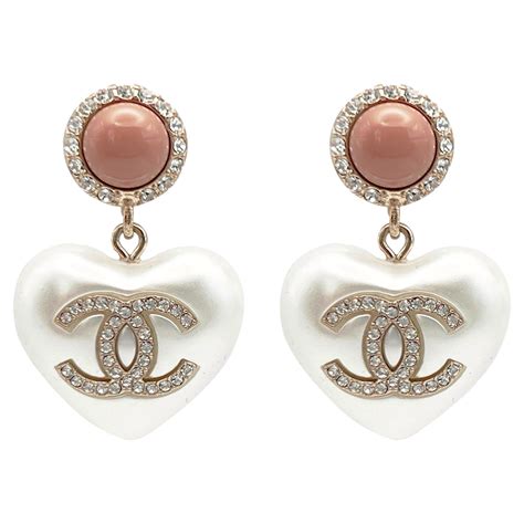 chanel gold heart earrings|chanel symbol earrings.